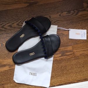 Tkees pop pom slides.